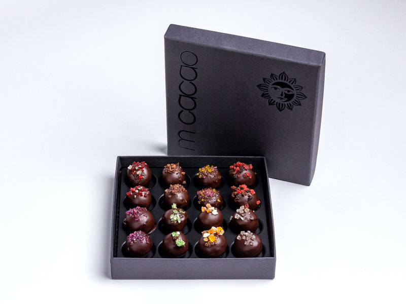 Box of chocolates with different truffle flavors