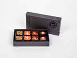 8 extremely hot peppers flavored chocolate pieces in a box