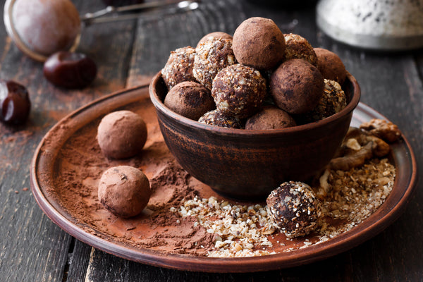 Bowl of round chocolate truffles balls