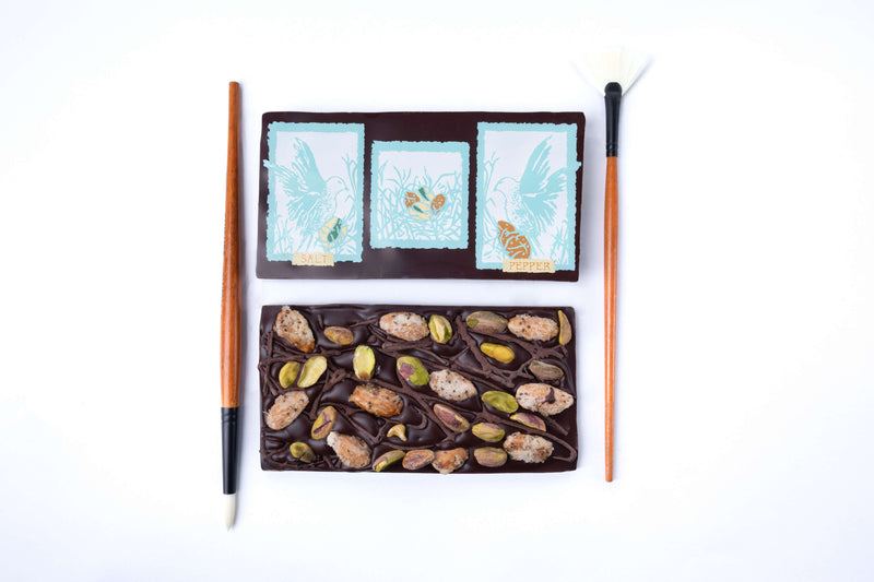 dark chocolate with pistachios and salt & pepper caramelized almonds